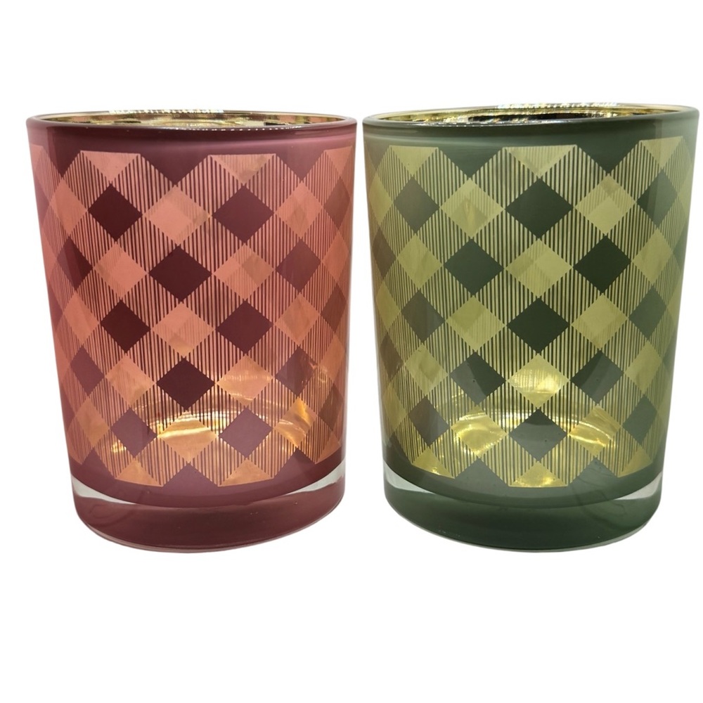 NWT Set of two glass candle holders. Green with gold and pink with gold.